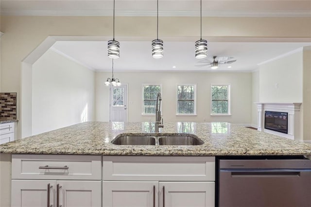 kitchen with white cabinetry, dishwasher, light stone countertops, ceiling fan with notable chandelier, and sink