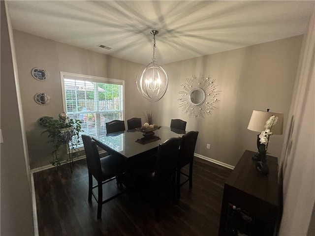 127 Spring Way Sq, Canton, GA 30114 - dining area with a chandelier and dark wood-style floors