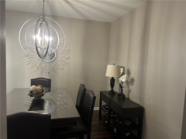 127 Spring Way Sq, Canton, GA 30114 - dining area with a chandelier and dark wood-style floors