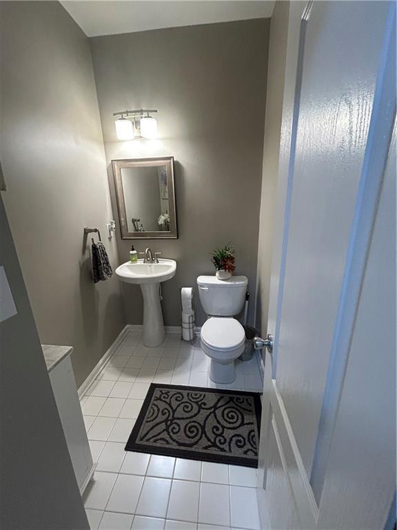 127 Spring Way Sq, Canton, GA 30114 - bathroom featuring toilet and tile patterned flooring
