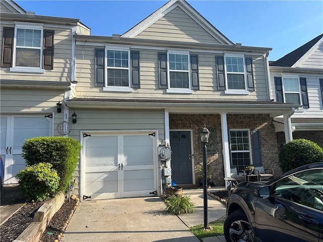 127 Spring Way Sq, Canton, GA 30114 - multi unit property with an attached garage and driveway