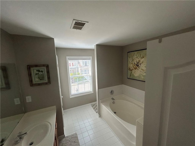 127 Spring Way Sq, Canton, GA 30114 - full bath featuring vanity, tile patterned flooring, and a bath