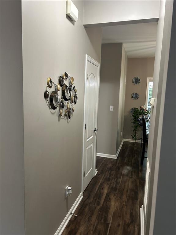 127 Spring Way Sq, Canton, GA 30114 - hall with dark wood finished floors and baseboards