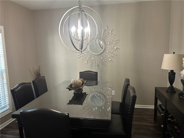 127 Spring Way Sq, Canton, GA 30114 - dining space featuring a chandelier and dark wood-type flooring