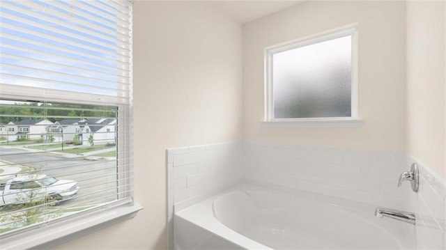 989 Blue Juniper Cir, Loganville, GA 30052 - bathroom with a bath