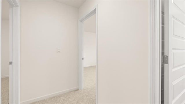 989 Blue Juniper Cir, Loganville, GA 30052 - hallway featuring carpet and baseboards