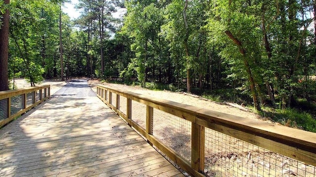 989 Blue Juniper Cir, Loganville, GA 30052 - dock area featuring a view of trees
