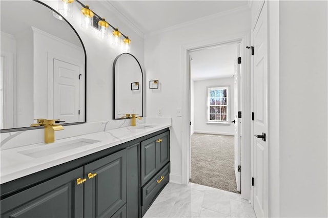 full bathroom with double vanity, ornamental molding, baseboards, and a sink