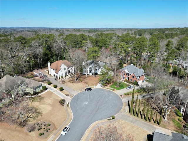 aerial view featuring a forest view