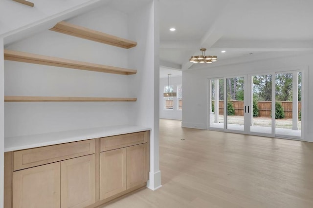 315 Hillcrest View Dr, Suwanee, GA 30024 - unfurnished living room featuring a chandelier, beam ceiling, recessed lighting, light wood-type flooring, and baseboards