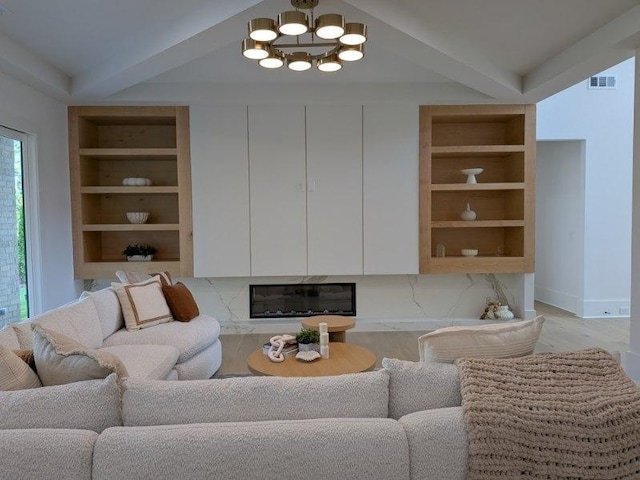 315 Hillcrest View Dr, Suwanee, GA 30024 - living area featuring built in shelves, a chandelier, beamed ceiling, and baseboards