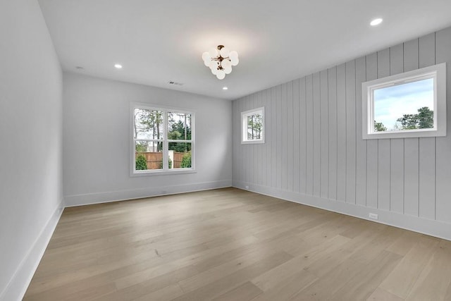 315 Hillcrest View Dr, Suwanee, GA 30024 - spare room featuring plenty of natural light, light wood-type flooring, baseboards, a chandelier, and recessed lighting