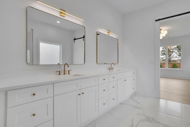 315 Hillcrest View Dr, Suwanee, GA 30024 - bathroom featuring double vanity and marble look tiles