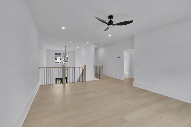 315 Hillcrest View Dr, Suwanee, GA 30024 - spare room featuring light wood-style flooring, ceiling fan, recessed lighting, and baseboards