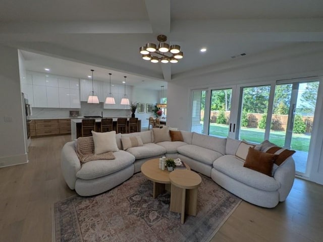 315 Hillcrest View Dr, Suwanee, GA 30024 - living room with a chandelier, recessed lighting, beamed ceiling, light wood finished floors, and coffered ceiling