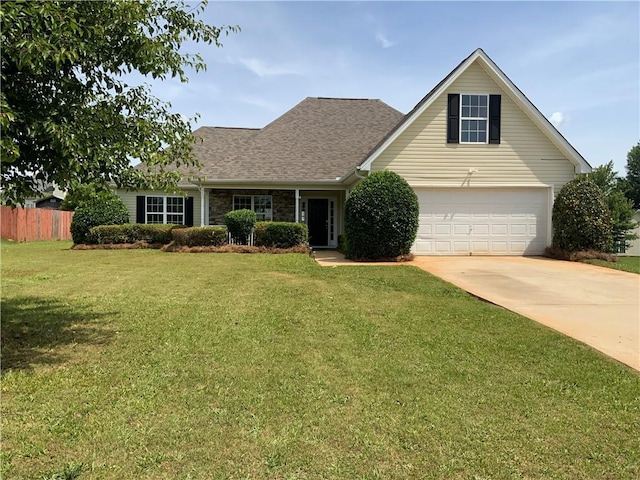 traditional home featuring driveway, an attached garage, and roof with shingles