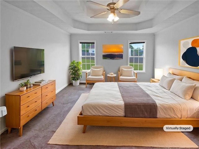 living area featuring plenty of natural light, a fireplace with flush hearth, and vaulted ceiling