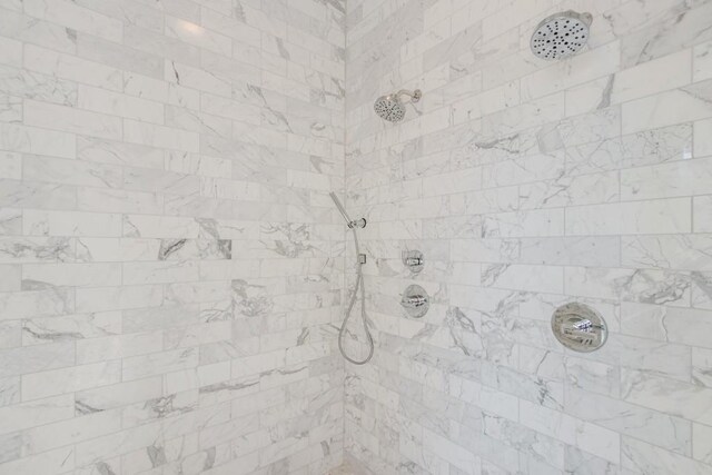 details featuring a tile shower