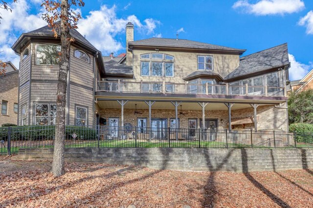 rear view of house with a balcony