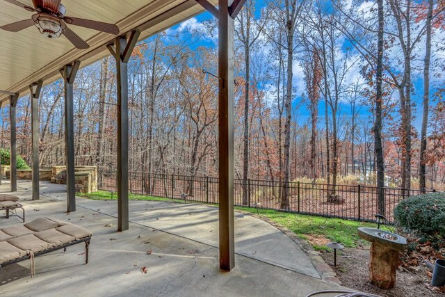 view of patio featuring ceiling fan