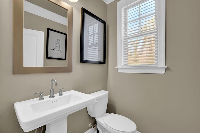 bathroom with sink and toilet