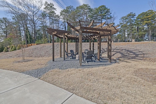 view of property's community featuring a pergola