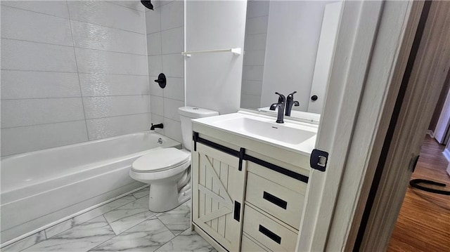 2388 Lawrenceville Hwy Unit D, Decatur, GA 30033 - bathroom featuring toilet, marble finish floor, vanity, and bathing tub / shower combination
