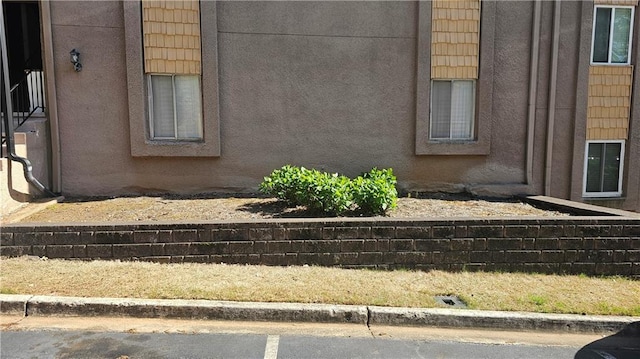 2388 Lawrenceville Hwy Unit D, Decatur, GA 30033 - view of side of home featuring stucco siding
