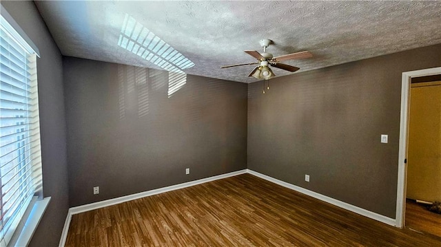 2388 Lawrenceville Hwy Unit D, Decatur, GA 30033 - spare room featuring wood finished floors, baseboards, and a ceiling fan