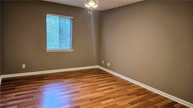 2388 Lawrenceville Hwy Unit D, Decatur, GA 30033 - empty room with ceiling fan, baseboards, and wood finished floors