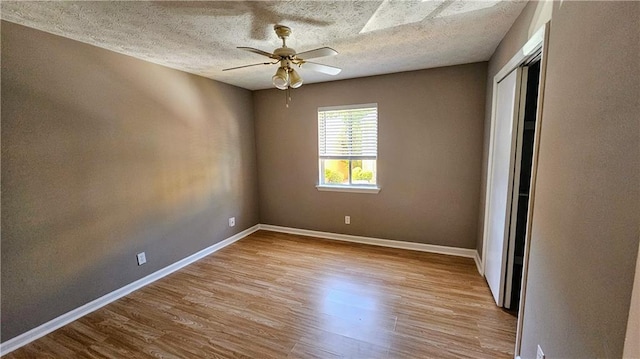 2388 Lawrenceville Hwy Unit D, Decatur, GA 30033 - interior space featuring a closet, baseboards, a ceiling fan, a textured ceiling, and wood finished floors