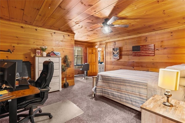 carpeted bedroom featuring wooden walls, ceiling fan, and wooden ceiling