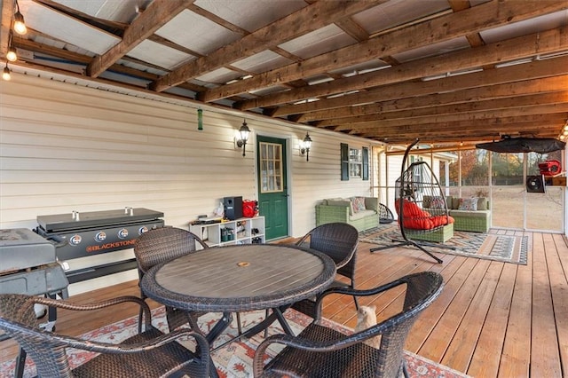 wooden deck with an outdoor hangout area