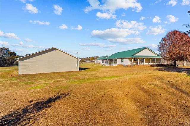 view of yard featuring a porch