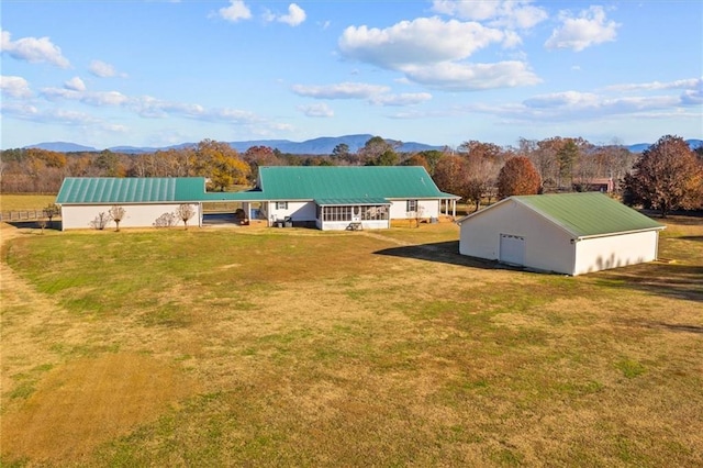 birds eye view of property featuring a mountain view