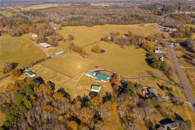 birds eye view of property featuring a rural view