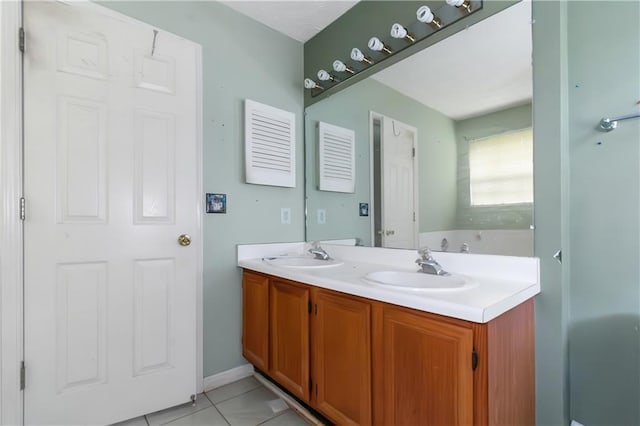 9550 Canvasback Ct, Jonesboro, GA 30238 - full bath featuring double vanity, tile patterned flooring, and a tub