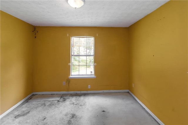 9550 Canvasback Ct, Jonesboro, GA 30238 - unfurnished room with baseboards and a textured ceiling