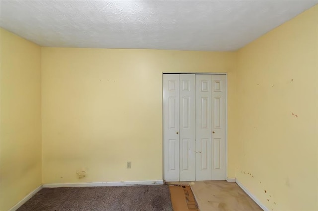 9550 Canvasback Ct, Jonesboro, GA 30238 - unfurnished bedroom with light colored carpet, baseboards, and a closet