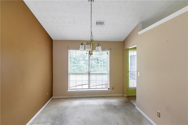 9550 Canvasback Ct, Jonesboro, GA 30238 - unfurnished dining area with a chandelier, baseboards, and a textured ceiling