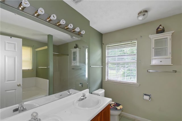 9550 Canvasback Ct, Jonesboro, GA 30238 - bathroom featuring toilet, a bath, double vanity, and a shower