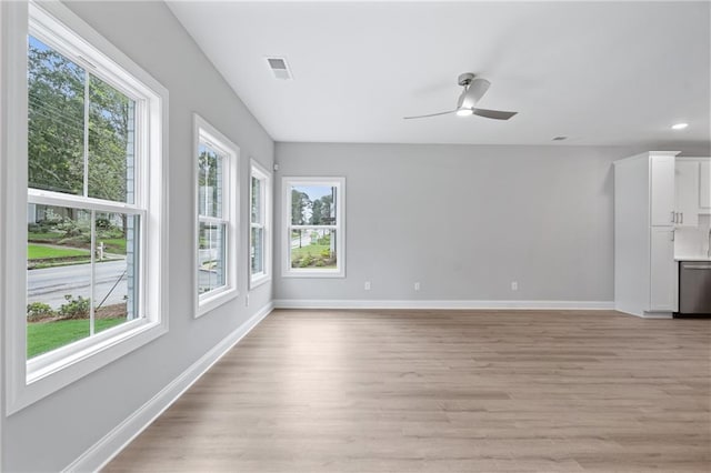 interior space featuring ceiling fan, recessed lighting, visible vents, light wood-style floors, and baseboards