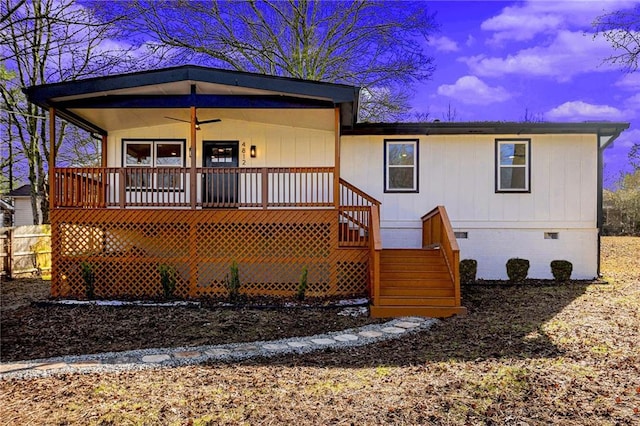 view of front of home featuring ceiling fan and a porch