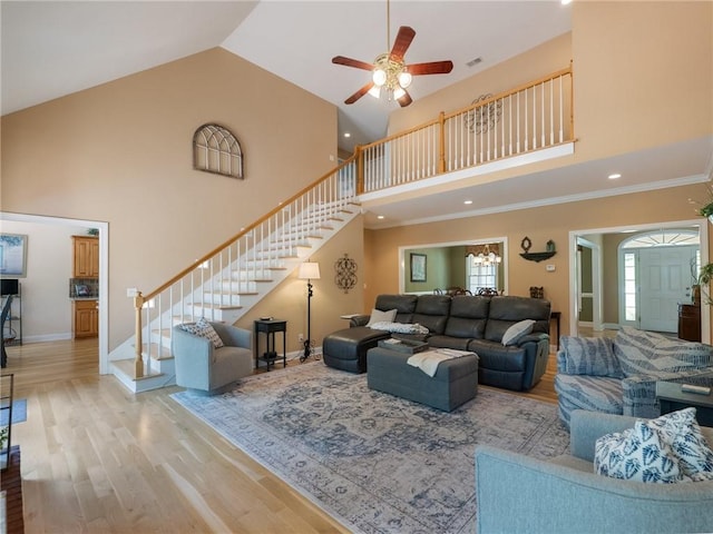 4523 Warwick Glen Pl, Flowery Branch, GA 30542 - living area featuring stairs, high vaulted ceiling, a ceiling fan, wood finished floors, and baseboards