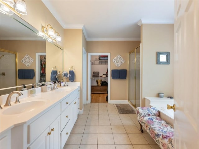 4523 Warwick Glen Pl, Flowery Branch, GA 30542 - full bath with tile patterned flooring, a stall shower, ornamental molding, double vanity, and a spacious closet