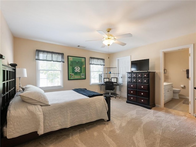 4523 Warwick Glen Pl, Flowery Branch, GA 30542 - bedroom featuring light carpet, connected bathroom, a ceiling fan, and baseboards