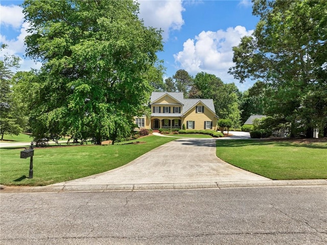 4523 Warwick Glen Pl, Flowery Branch, GA 30542 - view of front of home with a front lawn and concrete driveway