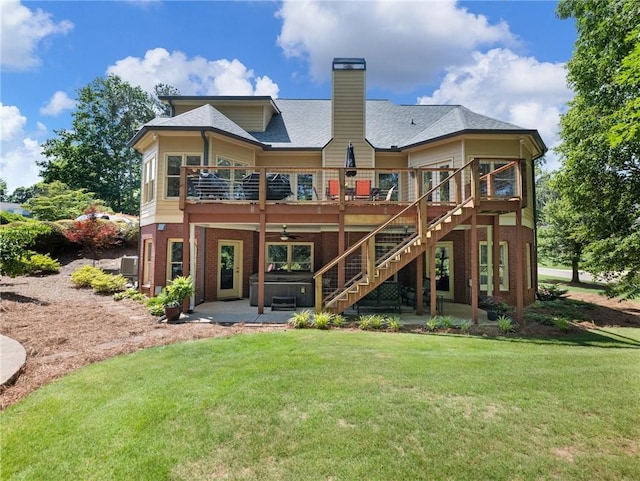 4523 Warwick Glen Pl, Flowery Branch, GA 30542 - rear view of house featuring a lawn, a patio, brick siding, a chimney, and ceiling fan