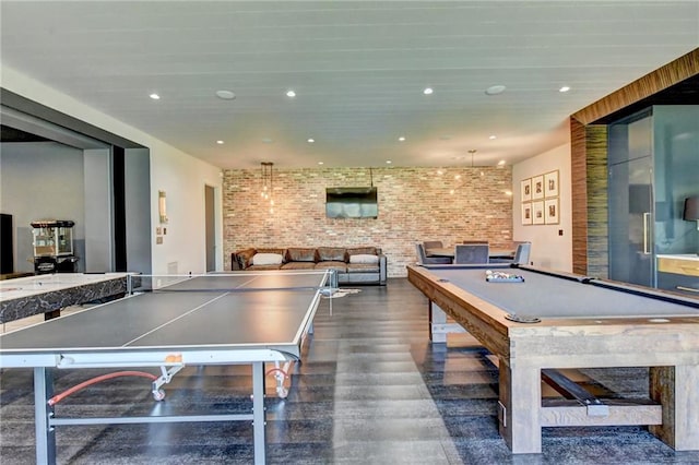 rec room featuring recessed lighting, brick wall, and billiards