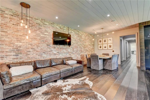 living area with recessed lighting, brick wall, wooden ceiling, and hardwood / wood-style flooring